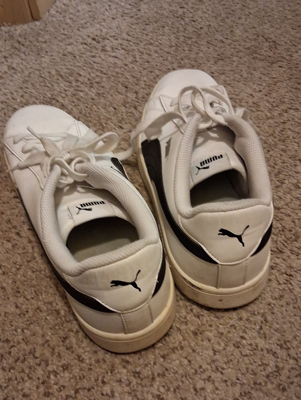 Puma Men’s White Sneakers with Black Stripe Accents